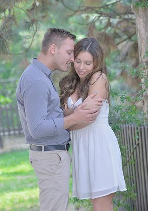 18 year old girl Katie Lewis stands naked after undressing in her bedroom